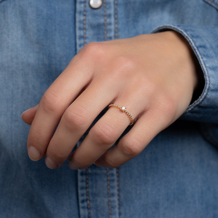 Bague boules solitaire en plaqué or 750/000 sertie d'un OZ – Une bague ...